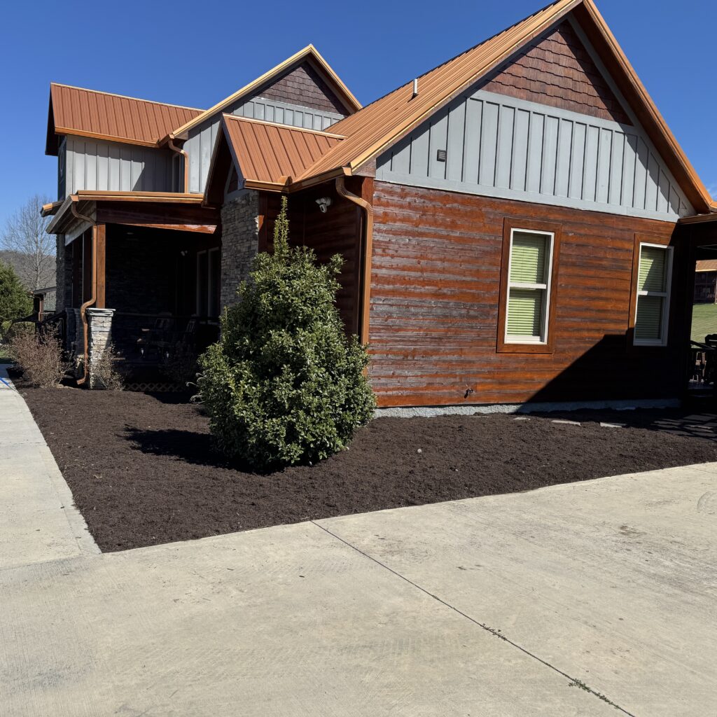 brown mulch against cabin